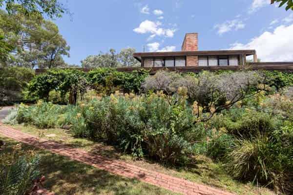 Green house, Harley St, Strathdale, Bendigo, Victoria. Mud brick house designed by Alistair Knox job number 685 plan dated March 1973