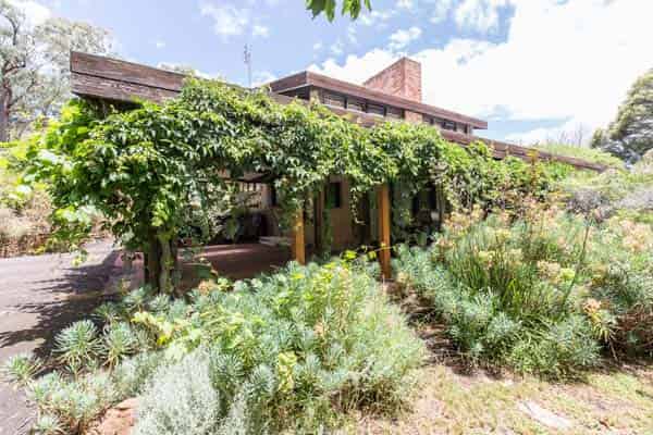 Green house, Harley St, Strathdale, Bendigo, Victoria. Mud brick house designed by Alistair Knox job number 685 plan dated March 1973