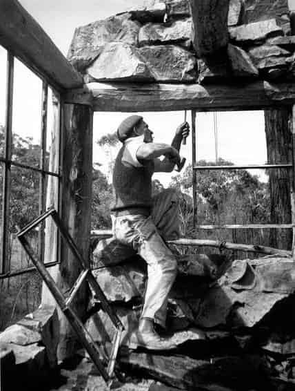 Danila Vassilief working on his Warrandyte house, Stonygrad. Photo: Albert Tucker State Library of Victoria