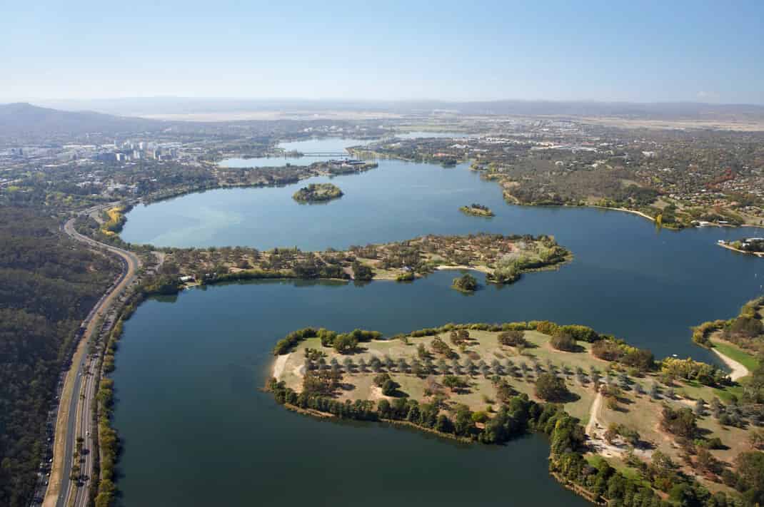 View of West Lake, Lake Burley Griffin from the west. Weston Park is the foreground and Black Mountain Peninsula in the middle-ground