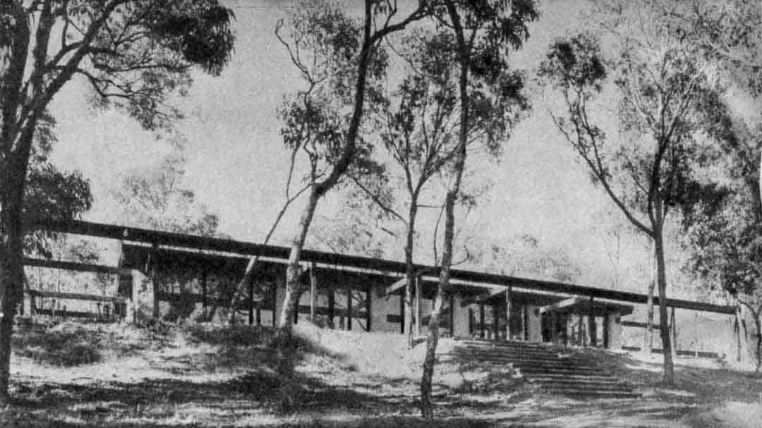ALISTAIR KNOX's view of Australia as a 'horizontal land with vertical rhythms' finds full expression in its treatment of the western facade. As gum leaves turn edge-on to the sun and admit light to the forest floor, so he has sought in his use of solid adobe piers and voids represented by glass to bring a 'translucent' quality to the house, with a suggestion of hidden surprises that beckon the visitor