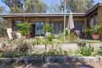 English house 50 Phillip St Lower Plenty VIC 3140. Alistair Knox's first mud brick house. Later extended by Knox